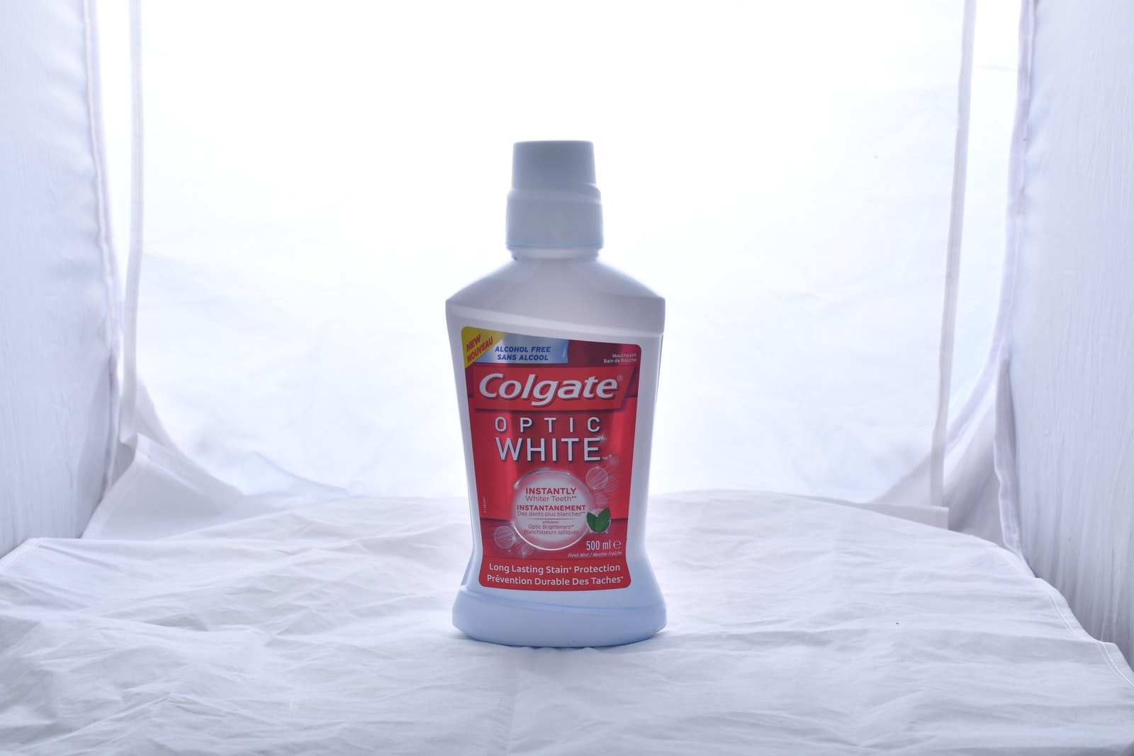 white and red plastic bottle